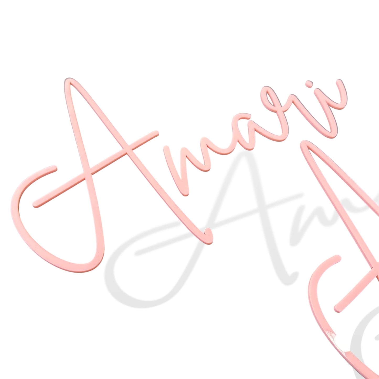 Modern acrylic name plaque for 'Amari' with minimalist baby pink glow – customisable room decor or wall sign